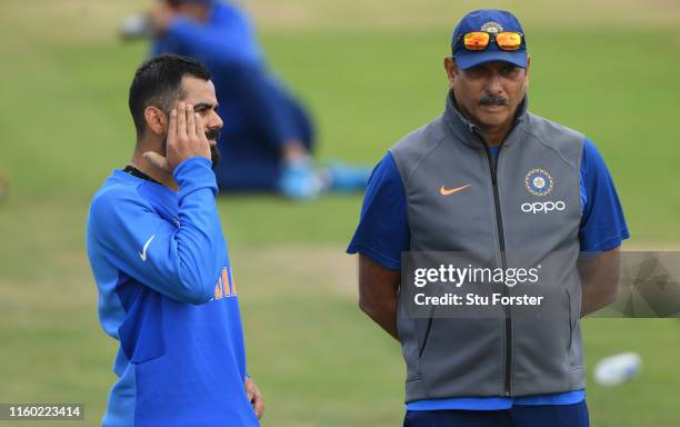 India captain Virat Kohli chats with coach Ravi Shastri during India nets ahead of their Cricket World Cup Match against Sri Lanka at Headingley on...