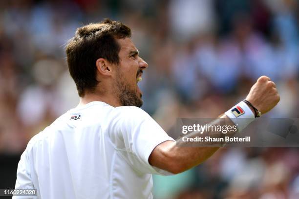 Guido Pella of Argentina celebrates victory in his Men's Singles third round match against Kevin Anderson of South Africa during Day five of The...