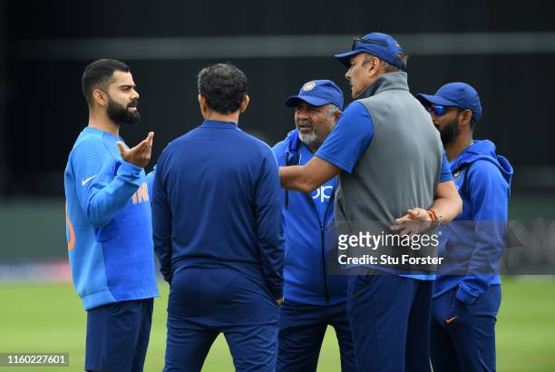 India captain Virat Kohli chats with coach Ravi Shastri and coaching staff during India nets ahead of their Cricket World Cup Match against Sri Lanka...