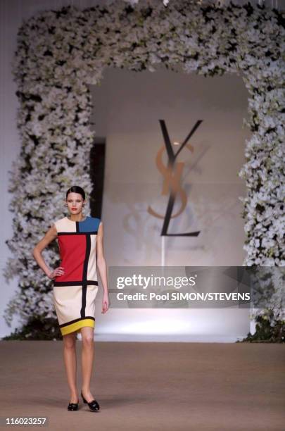 Model waring a "Mondrian dress" walks the runway during Yves Saint Laurent Spring-summer 2002 haute couture collections, on January 23, 2002 in...