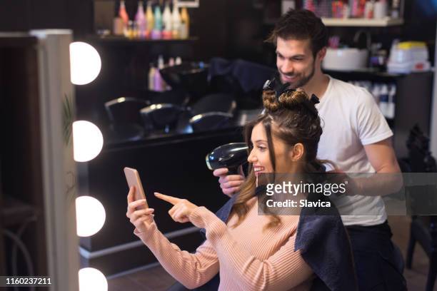 Woman Salon Phone Photos and Premium High Res Pictures - Getty Images