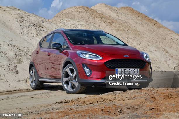ford fiesta active on the road - ford fiesta cars stock pictures, royalty-free photos & images