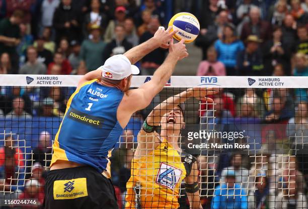 Julius Thole of Germany in action during the match against Alison Cerutti and Alvaro Filho of Brazil on day eight of the FIVB Beach Volleyball World...