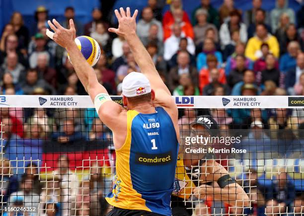 Clemens Wickler of Germany in action during the match against Alison Cerutti and Alvaro Filho of Brazil on day eight of the FIVB Beach Volleyball...