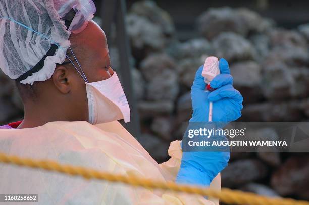 Nurse prepares a vaccine against Ebola in Goma on August 7, 2019. Three cases of the deadly virus was detected in the border city of Goma, the...