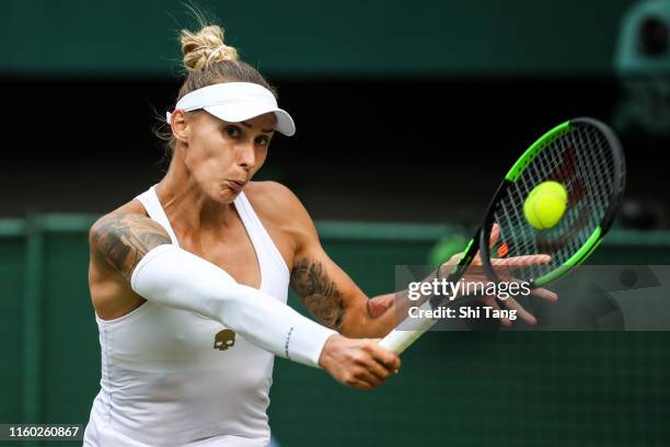 Polona Hercog of Slovenia plays a backhand in her Ladies' Singles third round match against Cori Gauff of The United States during Day five of The...