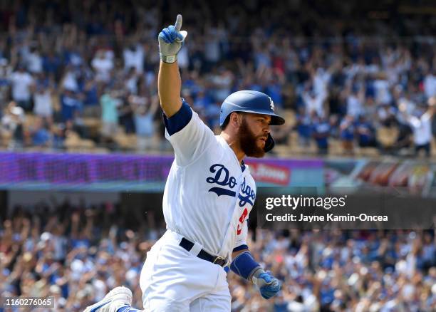 Russell Martin of the Los Angeles Dodgers celebrates after hitting a two RBI single for a walk-off win against the St. Louis Cardinals in the ninth...