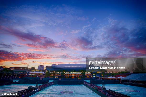 General view of the outside courts and centre court during Day five of The Championships - Wimbledon 2019 at All England Lawn Tennis and Croquet Club...