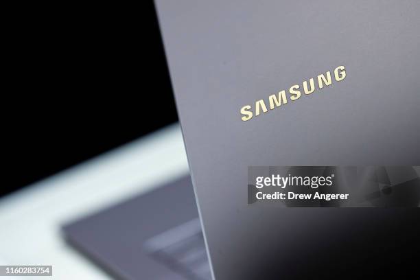 The Samsung logo is visible on the new Galaxy Book S laptop during a launch event at Barclays Center on August 7, 2019 in the Brooklyn borough of New...