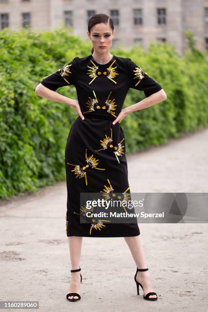 Coco Rocha is seen on the street during Berlin Fashion Week wearing black dress with yellow design pattern on July 05, 2019 in Berlin, Germany.