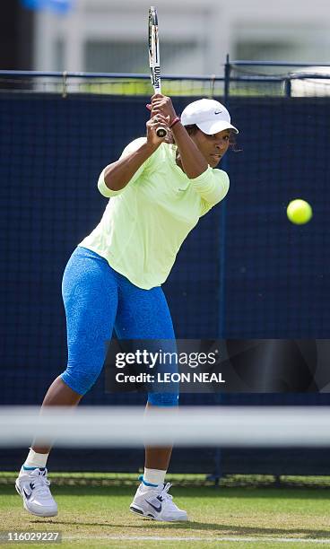 Serena Williams of the US trains ahead of her match against Tsvetana Pironkova of Bulgaria on the third day of the AEGON International tennis...