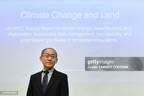 Intergovernmental Panel on Climate Change chairman Hoesung Lee looks arrives to a press conference on a special IPCC report on climate change and...