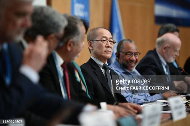 Intergovernmental Panel on Climate Change chairman Hoesung Lee , surrounded by co-chairs attends a press conference on a special IPCC report on...