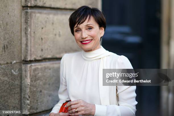 Kristin Scott Thomas is seen, outside Valentino, during Paris Fashion Week Haute Couture Fall/Winter 2019/20, on July 03, 2019 in Paris, France.