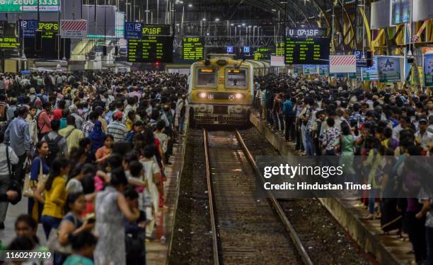 Stranded passengers at Churchgate Station following a power failure, which took place near Mahalaxmi station, halting Western suburban local train...