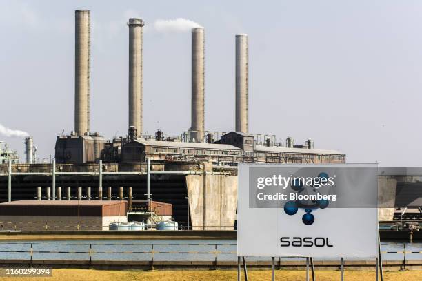 Emissions rise from towers at the Sasol Ltd. Sasol One Site in Sasolburg, South Africa, on Wednesday, Aug. 7, 2019. Sasol said some of its South...