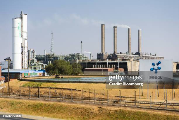 Emissions rise from towers at the Sasol Ltd. Sasol One Site in Sasolburg, South Africa, on Wednesday, Aug. 7, 2019. Sasol said some of its South...