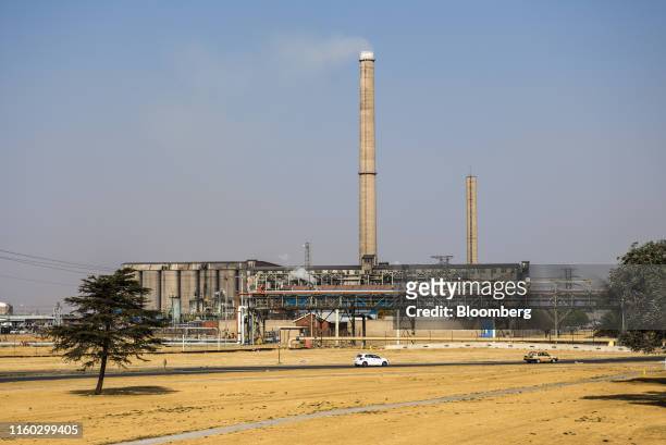 Emissions rise from towers at the Sasol Ltd. Sasol One Site in Sasolburg, South Africa, on Wednesday, Aug. 7, 2019. Sasol said some of its South...
