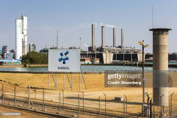 Emissions rise from towers at the Sasol Ltd. Sasol One Site in Sasolburg, South Africa, on Wednesday, Aug. 7, 2019. Sasol said some of its South...