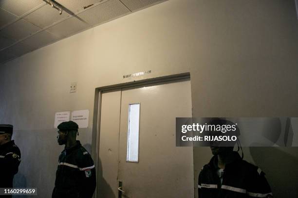 Gendarmes guard the autopsy room of the late British woman Alana Cutland, at Joseph Ravoahangy Andrianavalona Hospital in Antananarivo on August 8,...