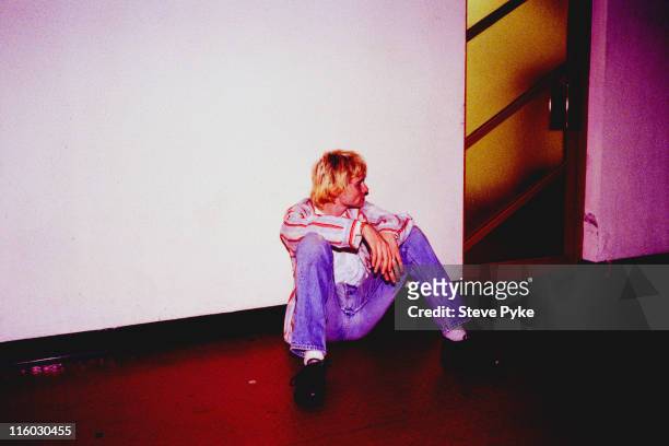 Singer and guitarist Kurt Cobain , of American rock group Nirvana, backstage, Belfast, 1992.