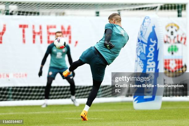 Fraser Forster hits the ball towards Harry Lewis in goal during a Southampton FC Training Session pictured at Staplewood Training Ground on August...