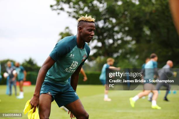 Moussa Djenepo looks on during a Southampton FC Training Session pictured at Staplewood Training Ground on August 08, 2019 in Southampton, England.