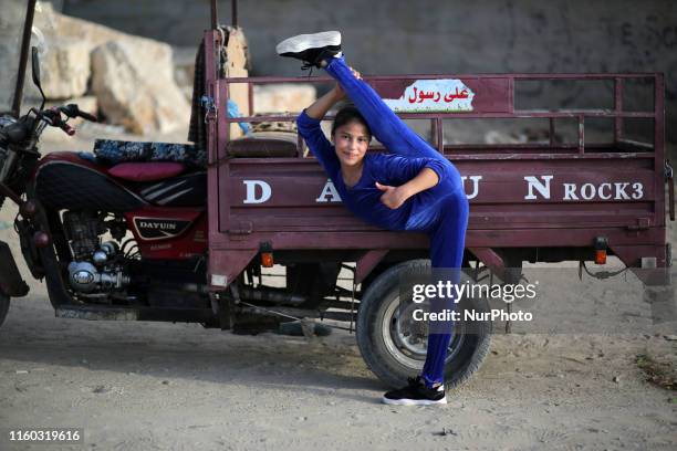 Palestinian girl Areej Ayoub, 11 years, hopes to break the Guinness world records with his bizarre feats of contortion, demonstrates acrobatics...