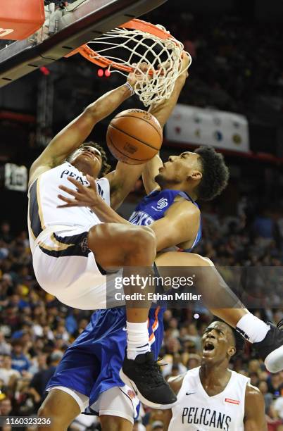 Frank Jackson of the New Orleans Pelicans dunks against Allonzo Trier of the New York Knicks during the 2019 NBA Summer League at the Thomas & Mack...