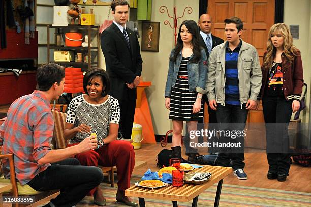 First Lady, Michelle Obama speaks to Jerry Trainor whilst she makes a special appearance on Nickelodeon's hit series "iCarly" at Nick On Sunset...