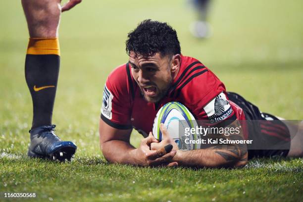 Codie Taylor of the Crusaders dives over to score a try during the Super Rugby Final between the Crusaders and the Jaguares at Orangetheory Stadium...