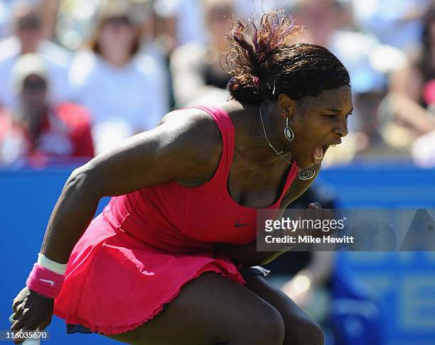 Serena Williams of USA celebrates a point in her match against Tsventana Pironkova of Bulgaria during day four of the AEGON International at...