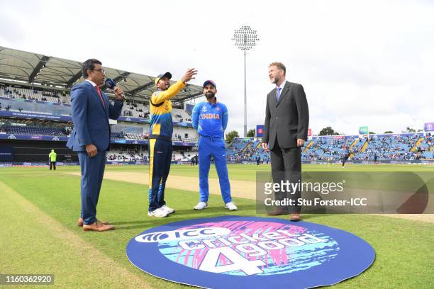 General view of the toss as Dimuth Karunaratne of Sri Lanka flips the coin during the Group Stage match of the ICC Cricket World Cup 2019 between Sri...
