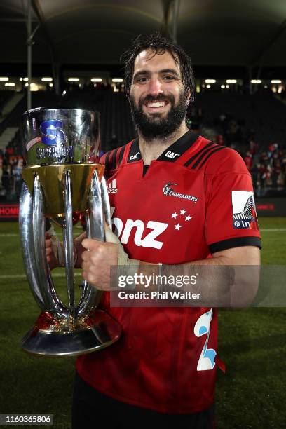 Sam Whitelock of the Crusaders holds the Super Rugby Trophy following the Super Rugby Final between the Crusaders and the Jaguares at Orangetheory...