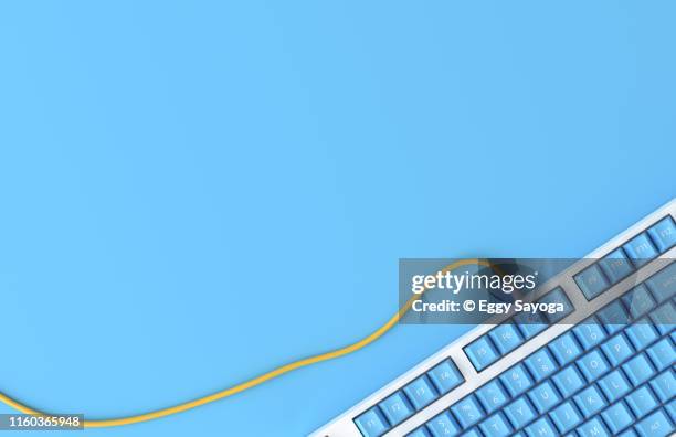 empty blue background and a keyboard - multi coloured buttons stock pictures, royalty-free photos & images