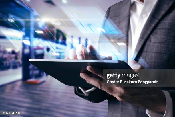 digital marketing. businessman using modern interface payments online shopping and icon customer network connection on virtual screen. - digital tablet photos et images de collection