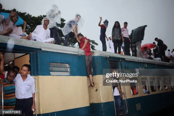 People seen leaving for their hometowns for the upcoming festival Eid-Ul-Adha at the airport railway station in Dhaka, Bangladesh on 08 Aug 2019.