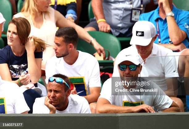 Jiri Vanek, coach of Petra Kvitova of The Czech Republic looks on from the stands in her Ladies' Singles third round match against Magda Linette of...