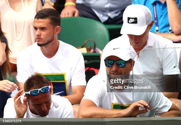 Jiri Vanek, coach of Petra Kvitova of The Czech Republic looks on from the stands in her Ladies' Singles third round match against Magda Linette of...