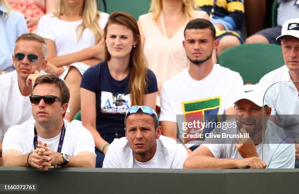 Jiri Vanek, coach of Petra Kvitova of The Czech Republic looks on from the stands in her Ladies' Singles third round match against Magda Linette of...