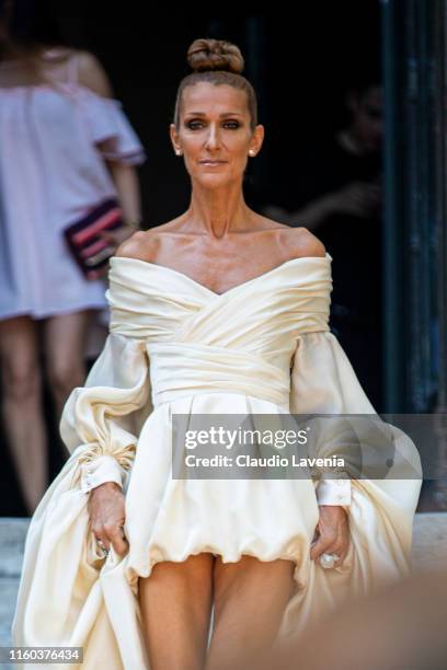 Celine Dion, wearing a cream maxi dress, is seen outside Alexandre Vauthier show during Paris Fashion Week - Haute Couture Fall/Winter 2019/2020 on...