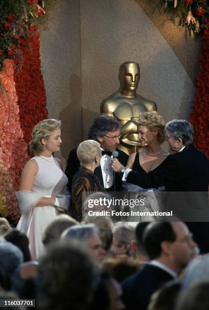 American film director Steven Spielberg with his wife Kate Capshaw and mother Leah Adler at the 66th Academy Awards, held at the Dorothy Chandler...