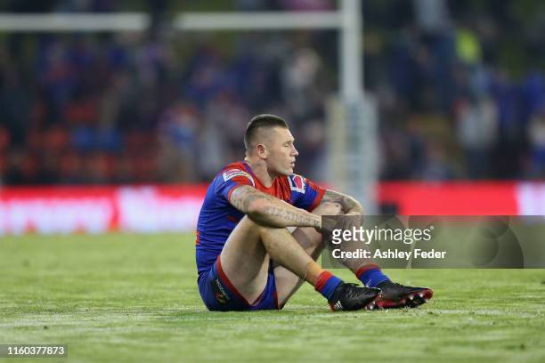 Shaun Kenny-Dowall of the Newcastle Knights looks dejected after losing during the round 16 NRL match between the Newcastle Knights and the New...