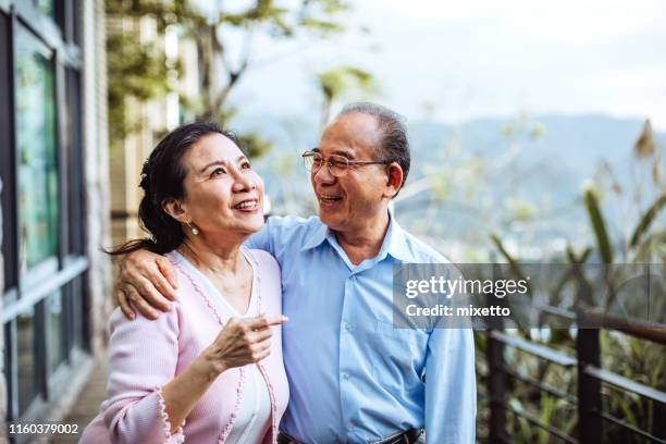 joyful moments - asian wife stock pictures, royalty-free photos & images