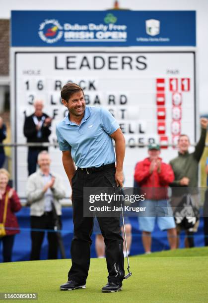 Robert Rock of England reacts to his birdie putt on the seventeenth hole during Day Three of the Dubai Duty Free Irish Open at Lahinch Golf Club on...