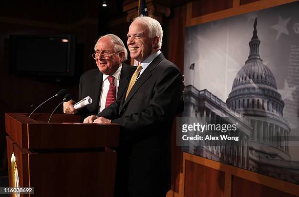 Senate Armed Services Committee Chairman Sen. Carl Levin and ranking member Sen. John McCain speak to the media during a news conference June 14,...