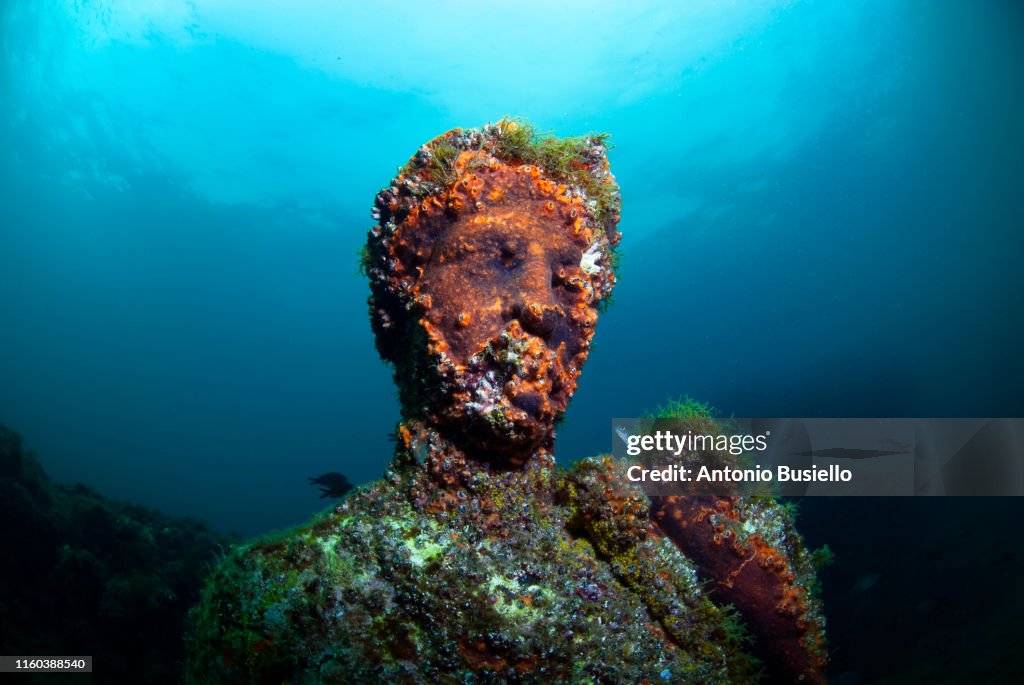 Baiae, Naples, Campania, Southern Italy - May, 2018: Submerged statue head