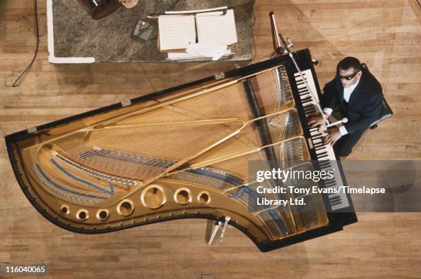 American soul and blues musician Ray Charles at the piano, 1964.