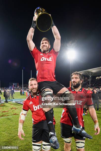 Kieran Read of the Crusaders lifts the Super Ruugb trophy after winning the Super Rugby Final between the Crusaders and the Jaguares at Orangetheory...