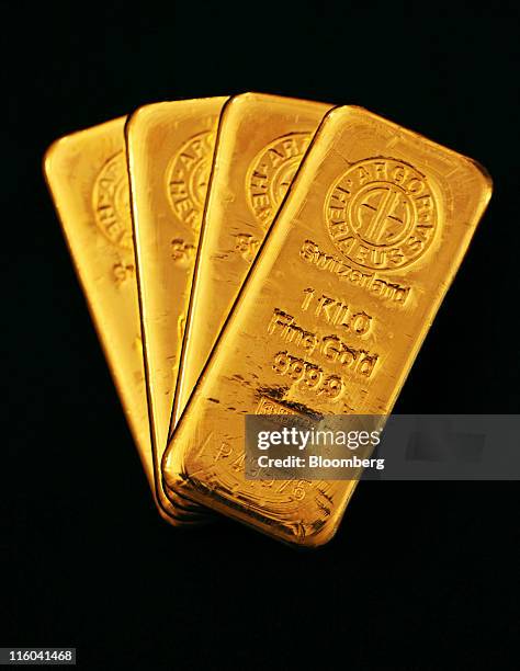 Argor Heraeus SA branded one kilogram gold bars are seen in this arranged photograph at Gold Investments Ltd. Bullion dealers in London, U.K., on...